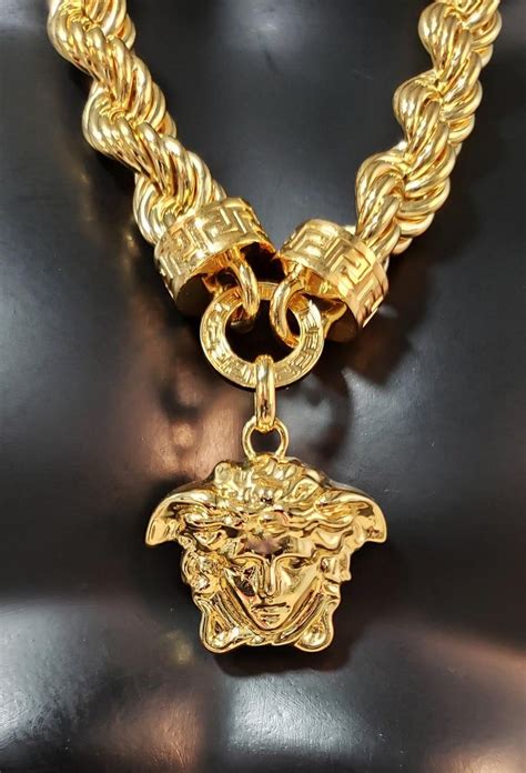 versace gold plated chain link bracelet|versace small medusa head necklace.